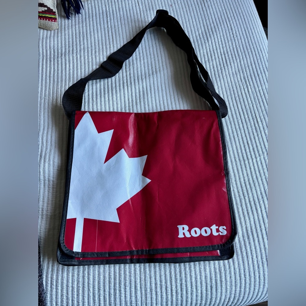 Roots Red and White re-useable messenger Bag.